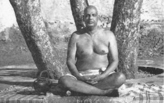 Swami Sivananda meditating