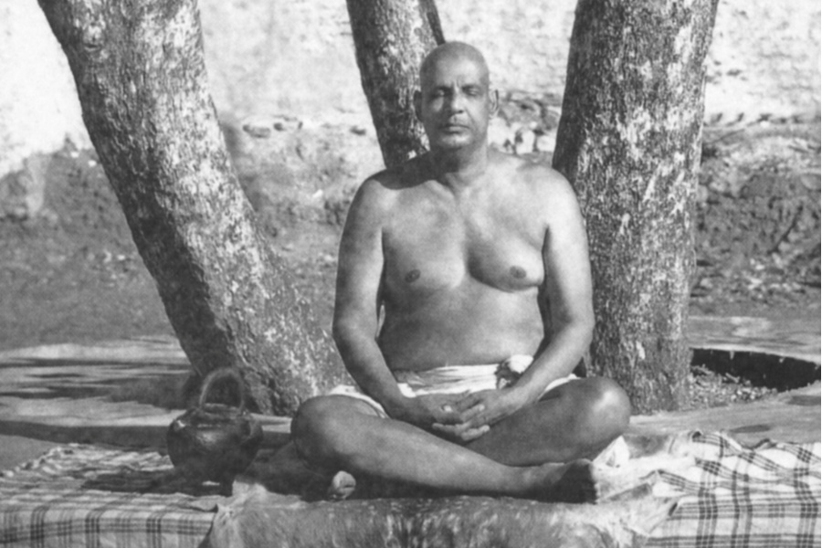 Swami Sivananda meditating